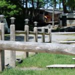 Trailers on sites with fence in the foreground